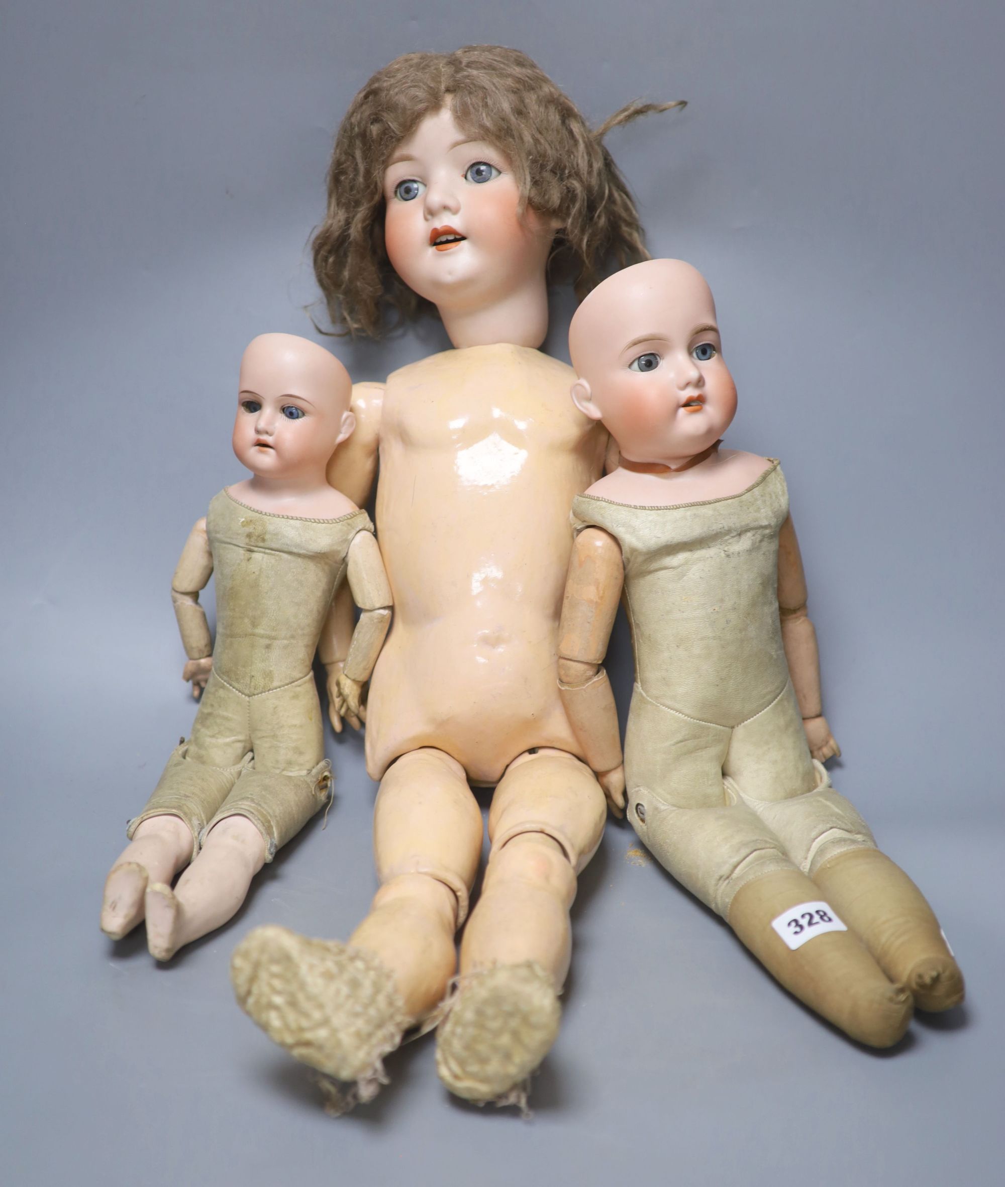 Two Armand Marseille bisque head dolls, 370 AM 4 DEP and 370 AM 2/0 DEP, with jointed kid bodies and a Koppelsdorf bisque head doll, ta